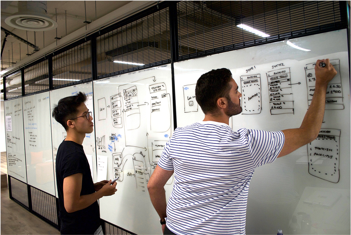 Design workshop: sketching Premier wireframes on a whiteboard